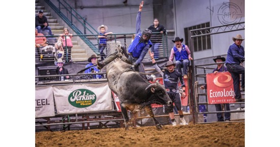 MPCC Rodeo Team member Koby Jacobson rides for eight at the Jackrabbit Stampede in Brookings, S.D. over the weekend. Jacobson took the Reserve All-Around title after winning the bull riding and placing third in the steer wrestling. (Photo courtesy of Hailey Hepperly Photography)